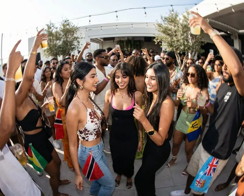 Soca Forever rooftop crowd dancing in the sun